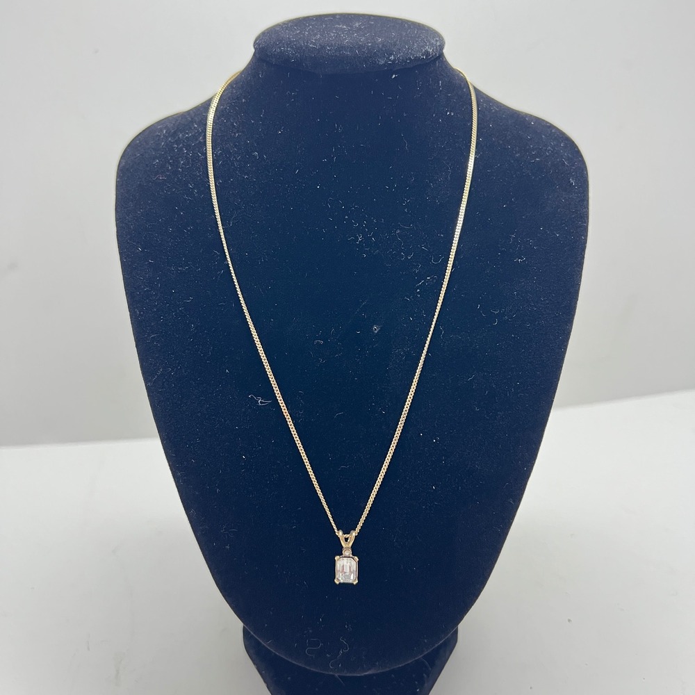 1928 Jewelry Gold Tone Emerald Cut Clear Crystal Pendant Necklace Barrel Clasp